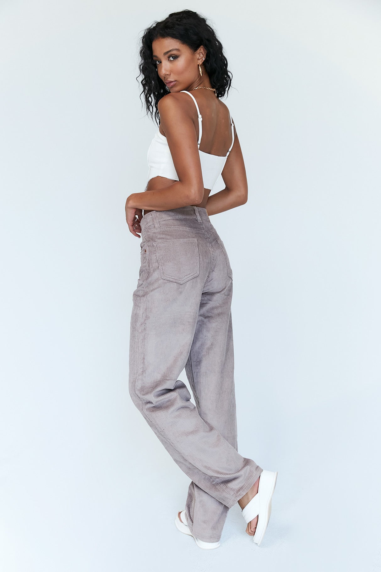 back view of model wearing Princess Polly Motel Parallel Jeans Smoke Grey Mid Rise 