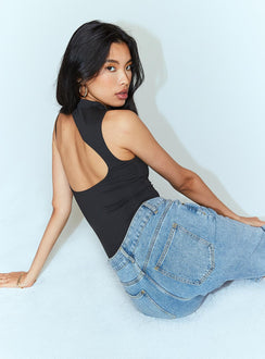 side view of model wearing Princess Polly Molly Asymmetric Bodysuit Black Sleeveless 