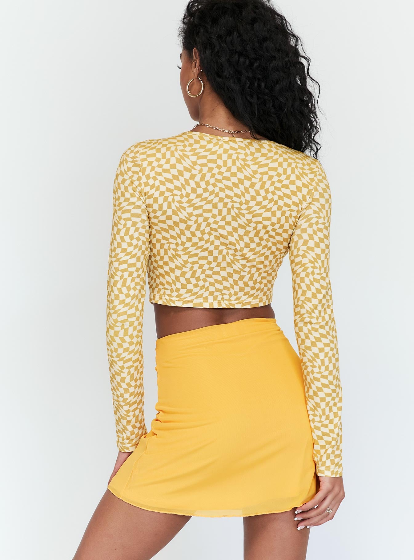 back view of model wearing Princess Polly Baxter Mini Skirt Orange 