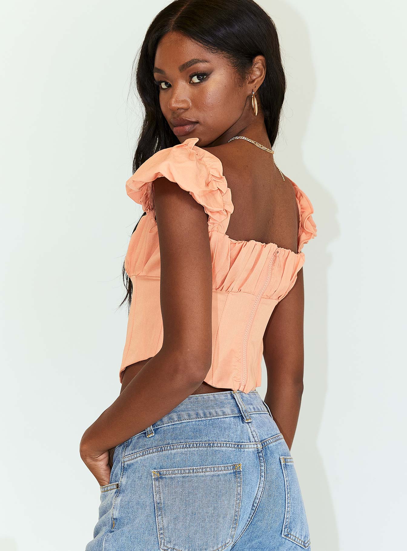 back view of model wearing Princess Polly Harry Top Orange 