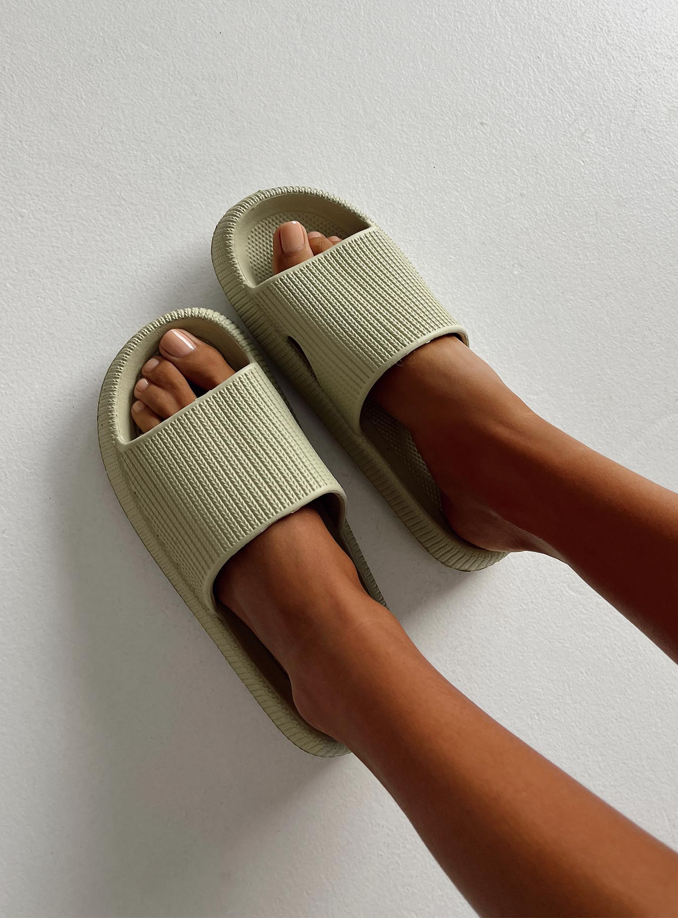 Slides Rubber design  Single wide upper  Platform base  Lightweight 