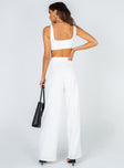 Matching set Crop top Fixed straps Invisible zip fasting at side High waisted pants Wide relaxed leg Belt loops at waist Zip & button fastening Stuble pleats at waist Twin hip pockets