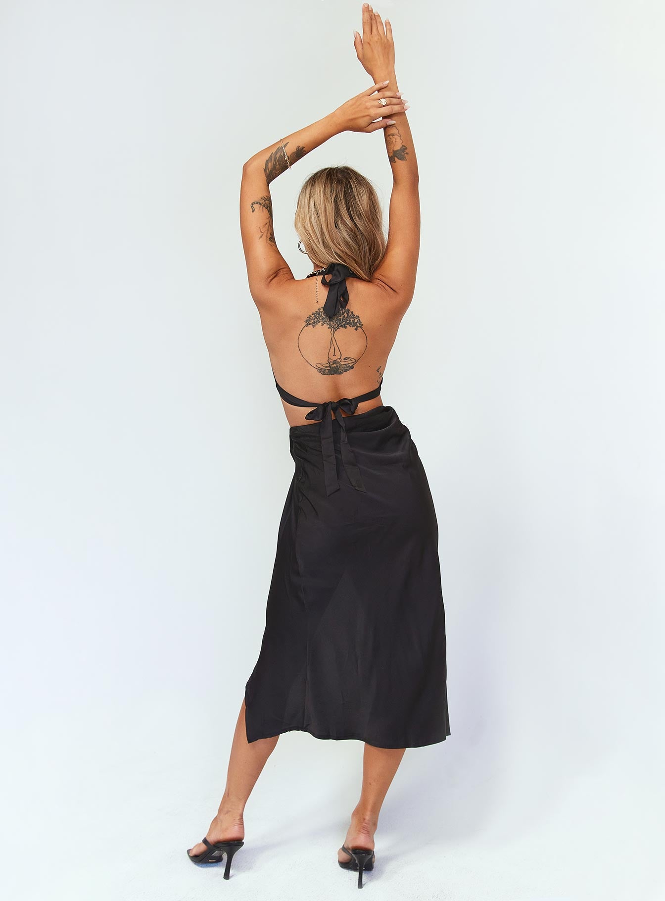 back view of model wearing Princess Polly Lilo Midi Dress Black 