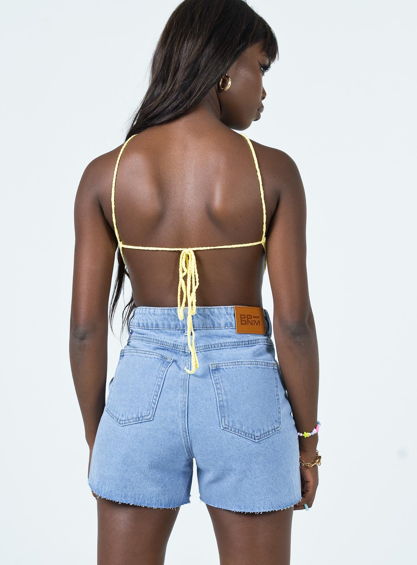 back view of model wearing Princess Polly Avoca Top Yellow 