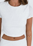 Matching set Textured material Cropped tee Low rise mini skirt  Elasticated waistband  Side slit  Good stretch  Fully lined 