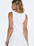 White top Textured material Lace trim at neckline and hem Tie fastening at front