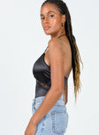 side view of model wearing Princess Polly Zella Bodysuit Black Sleeveless Plunger 