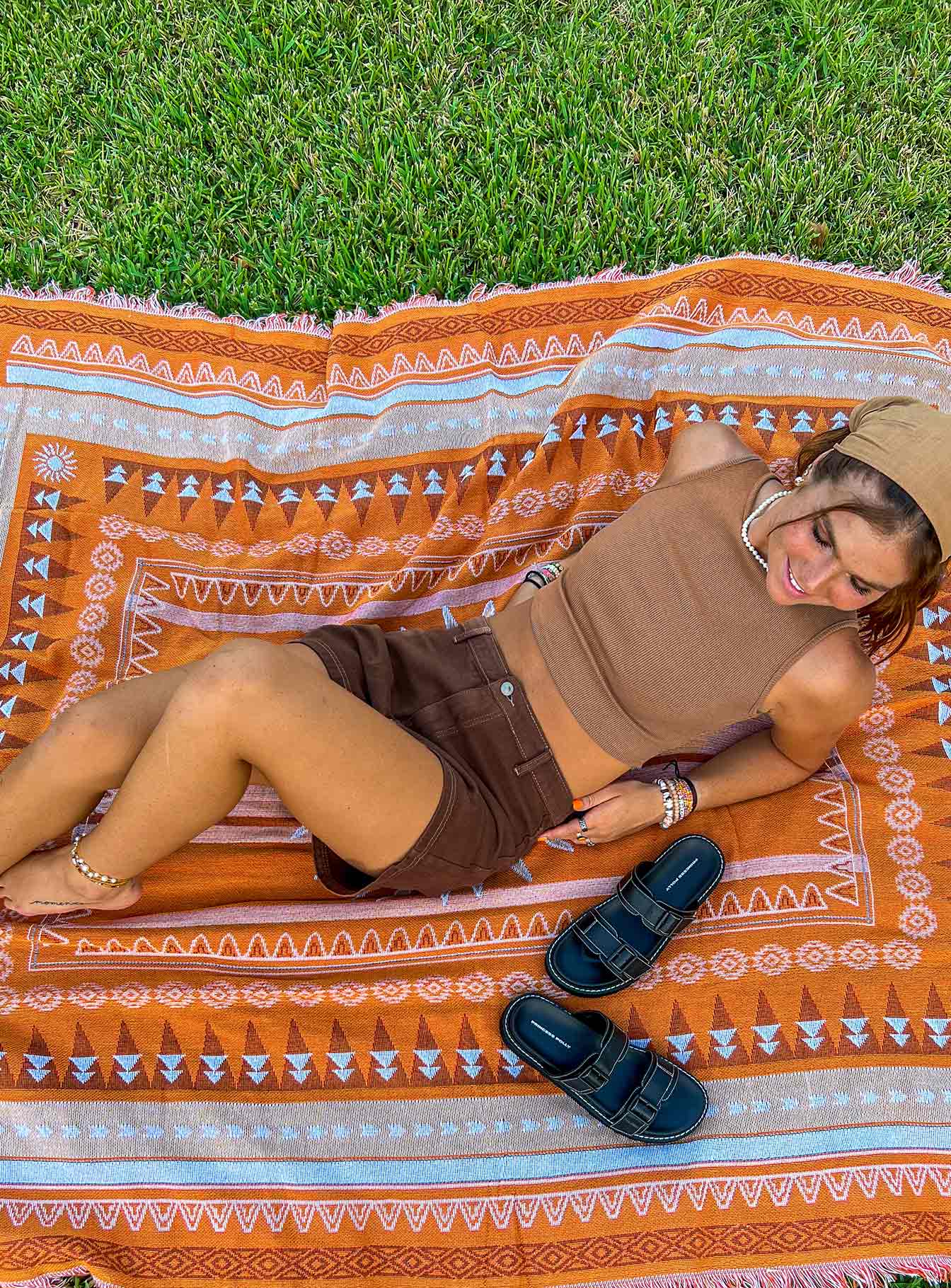 back view of model wearing Princess Polly Darby A Line Short Brown High Waisted Shorts 