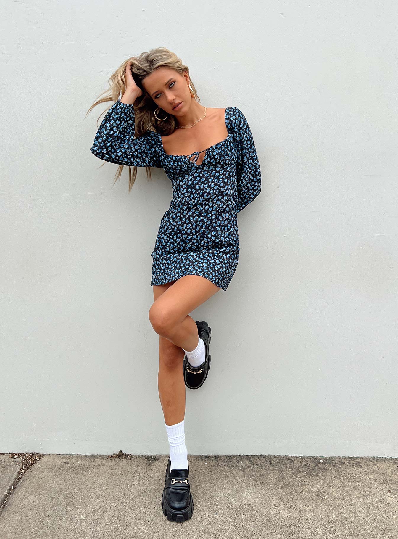 Front view of model wearing  front Princess Polly High Neck  Yallara Long Sleeve Mini Dress Black / Floral