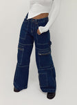 Front view of model wearing  front Princess Polly Mid Rise  The Ragged Priest Clacker Jean Mid Blue Denim