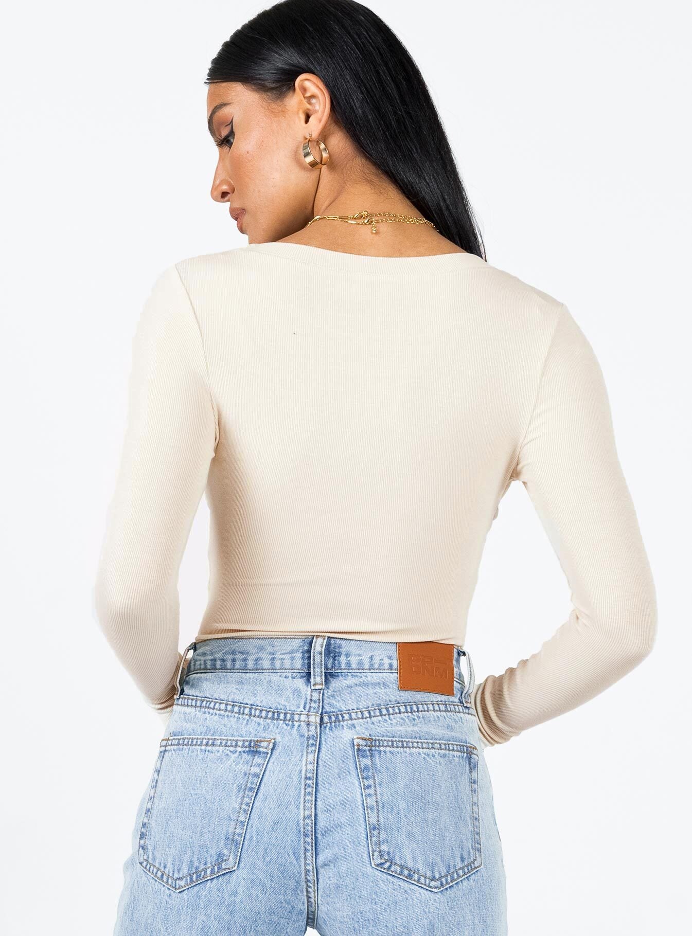 back view of model wearing Princess Polly Swenson Long Sleeve Bodysuit Beige Full Sleeves Crew Neck 