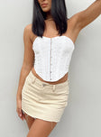 Front view of model wearing  front Tianna Cream Denim Mini Skirt Mid Rise Princess Polly  Mini Skirts 