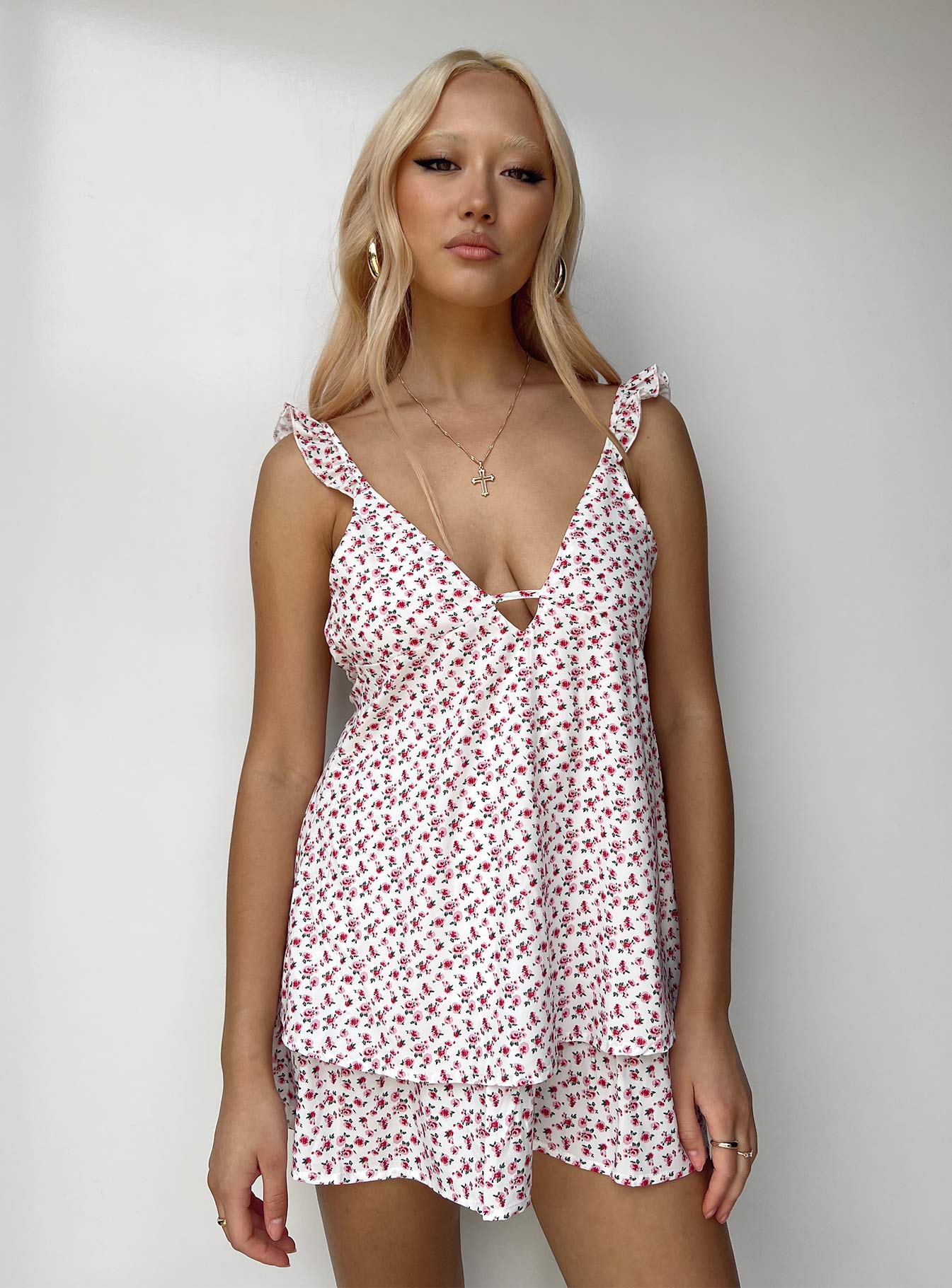 Front view of model wearing  front Princess Polly V-Neck  Damelio Mini Dress White / Floral