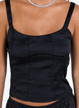 Front view of model wearing  front Princess Polly Sleeveless Square Neck  Golda Satin Corset Top Black