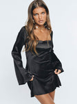 Front view of model wearing  front Princess Polly High Neck  Braydon Long Sleeve Mini Dress Black