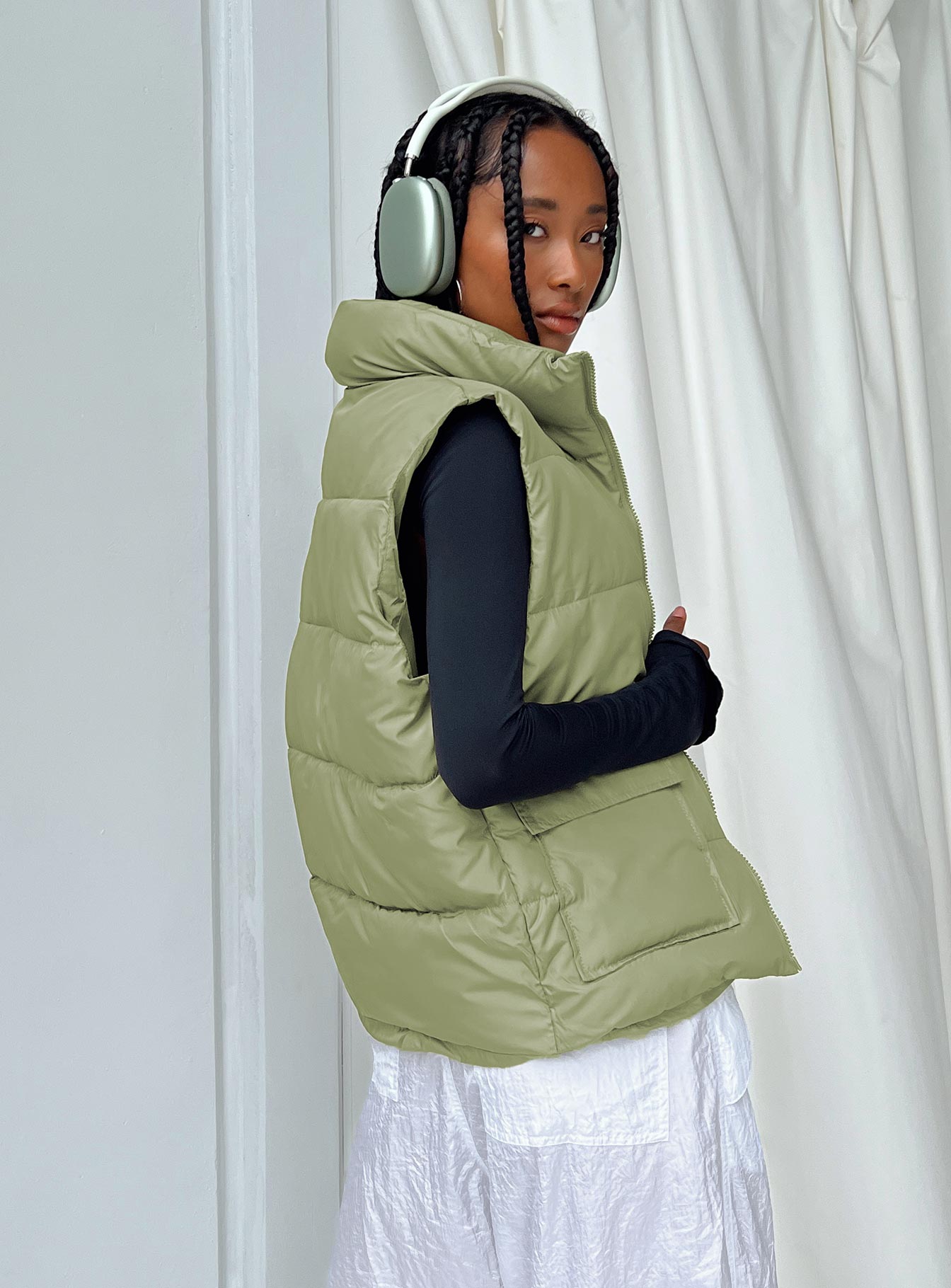 Puffer vest High neck Zip front fastening Twin hip pockets Non-stretch