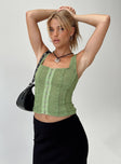 Front view of model wearing  front Princess Polly Sleeveless Square Neck  Lauder Top Green