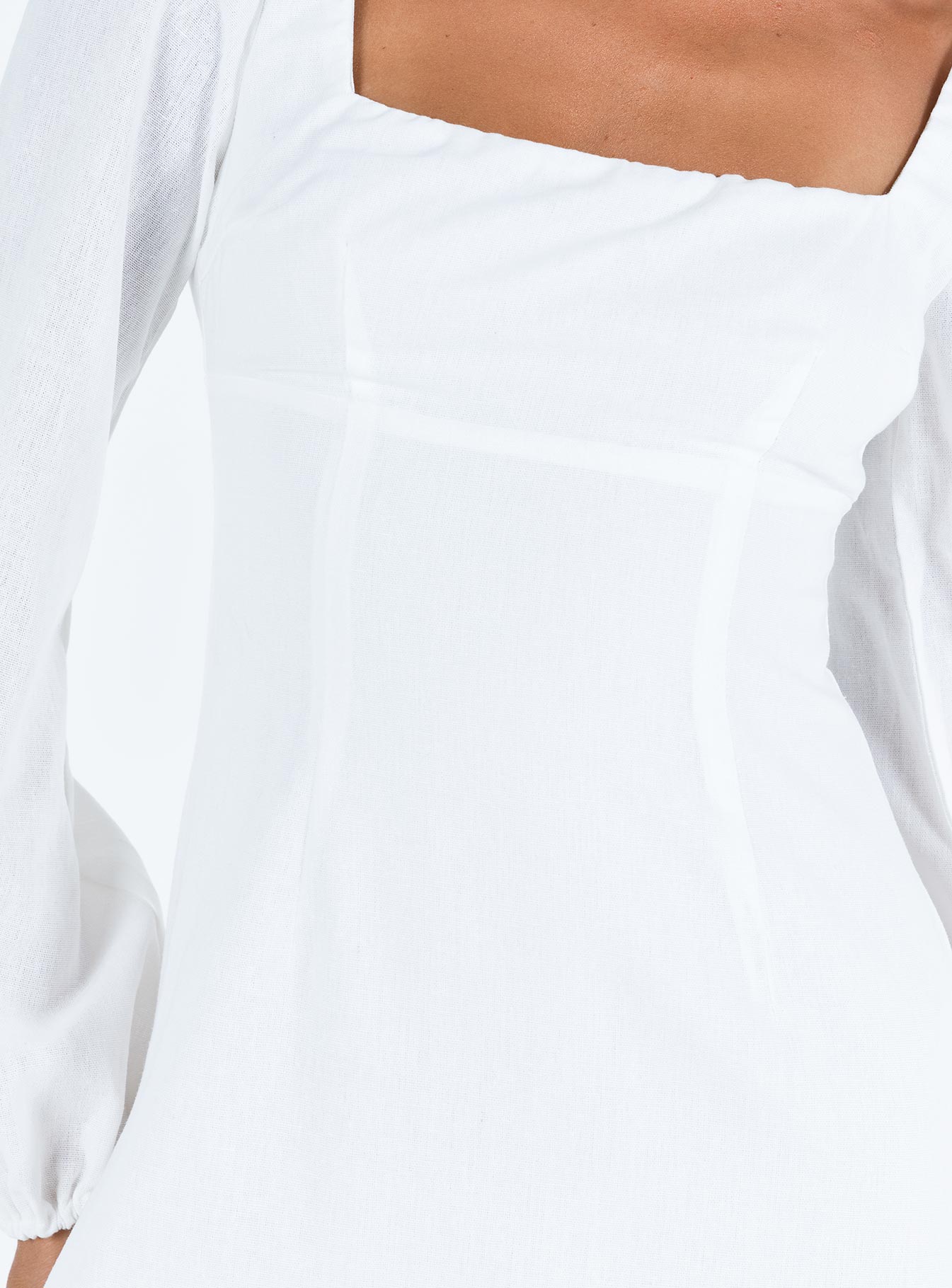 Front view of model wearing  front Princess Polly Square Neck  Hastings Long Sleeve Mini Dress White