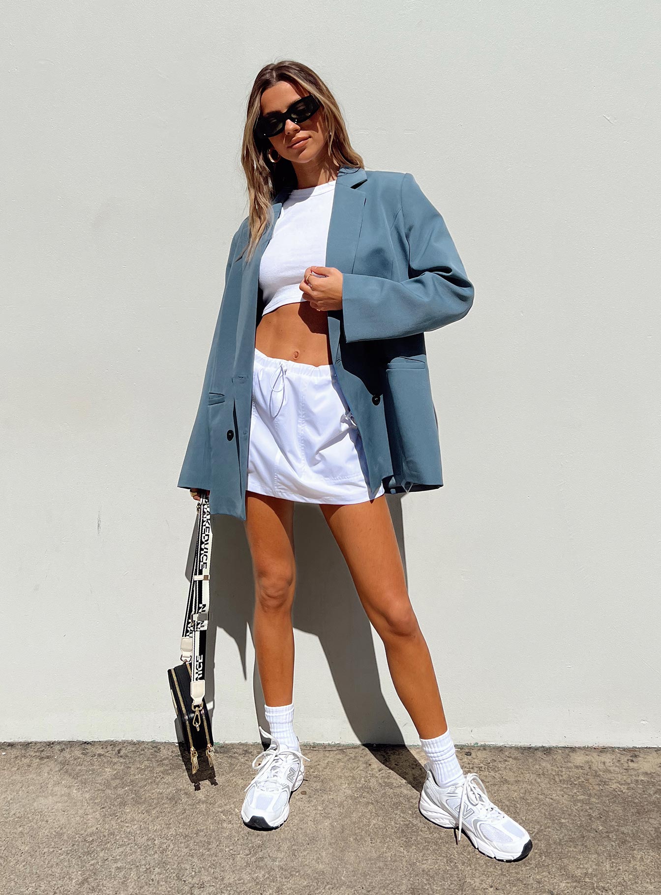 Oversized blazer in slate grey Double button fastening Twin front pockets Padded shoulders Lapel collar Split at back