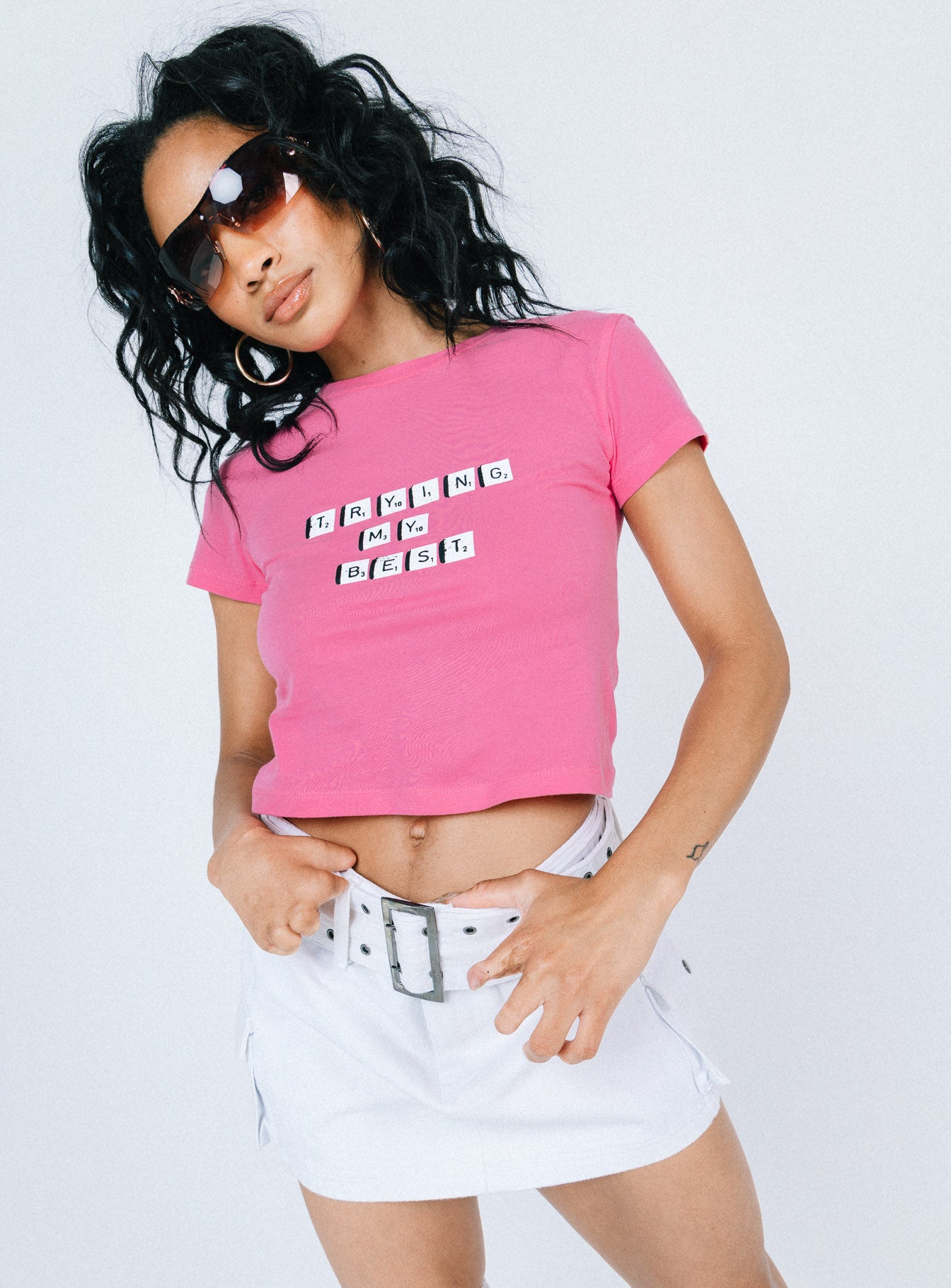 Front view of model wearing  front Princess Polly Short Sleeves Crew Neck  Arlie Graphic Tee Pink