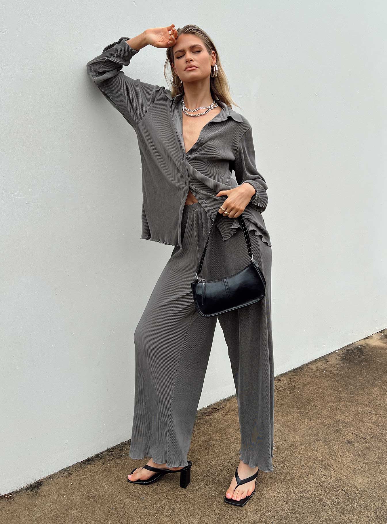 Front view of model wearing  front Princess Polly Full Sleeves High Neck  Cartmore Plisse Top Charcoal