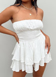 White strapless romper Soft textured material Shirred bust Ruffle detailing Layered ruffle hem