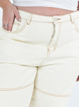 Front view of model wearing  front Princess Polly Mid Rise  Copeland Jeans White Curve