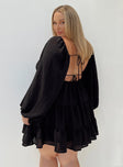 Front view of model wearing  front Princess Polly Crew Neck  Danny Long Sleeve Mini Dress Black Curve