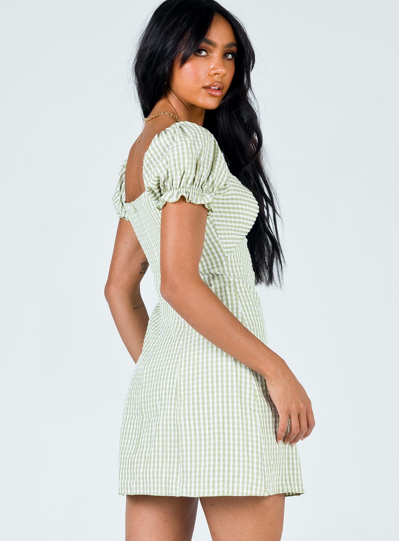 side view of model wearing Princess Polly Freyah Mini Dress Green 