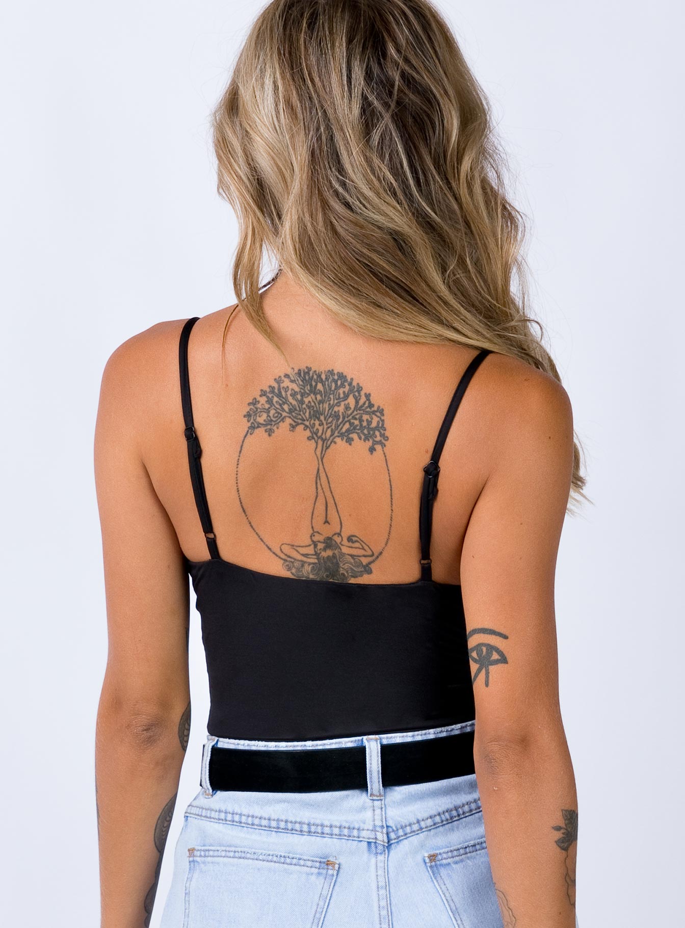 back view of model wearing Princess Polly Levey Bodysuit Black Sleeveless Scoop Neck 