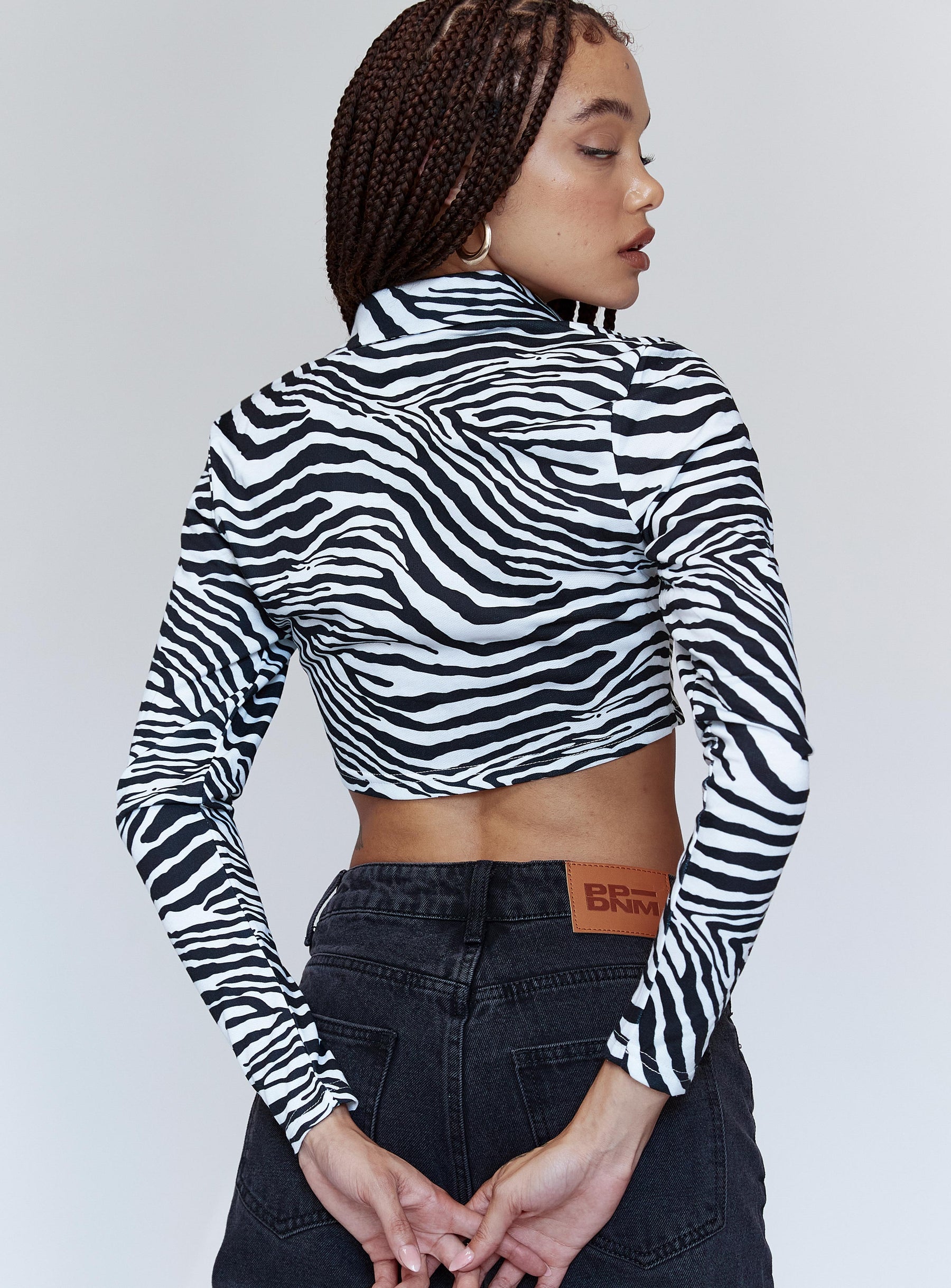 back view of model wearing Princess Polly Jayla Long Sleeve Top Black / White 