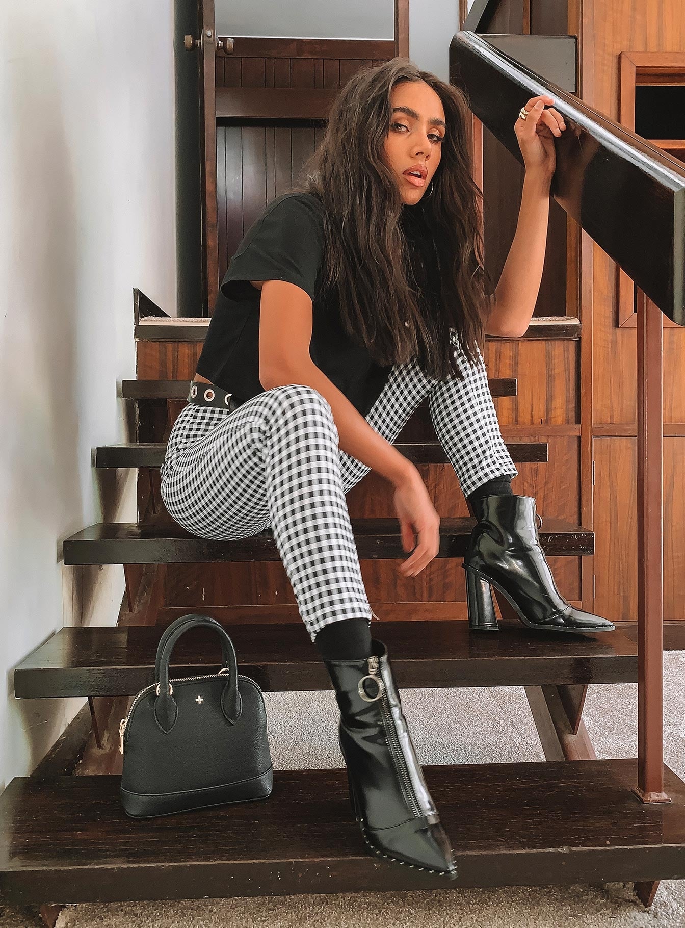 front view of model wearing Princess Polly Iggy Gingham Pants Black/White 