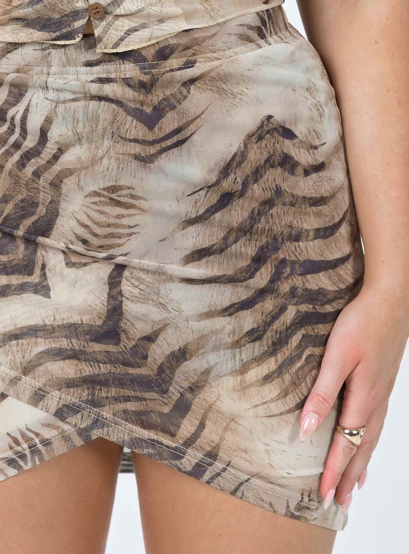 back view of model wearing Princess Polly Motel Plata Skirt Tiger Brown 