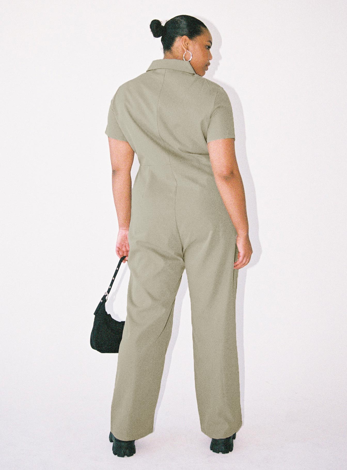 Jumpsuit Classic collar Zip fastening at front Twin chest pockets Straight leg