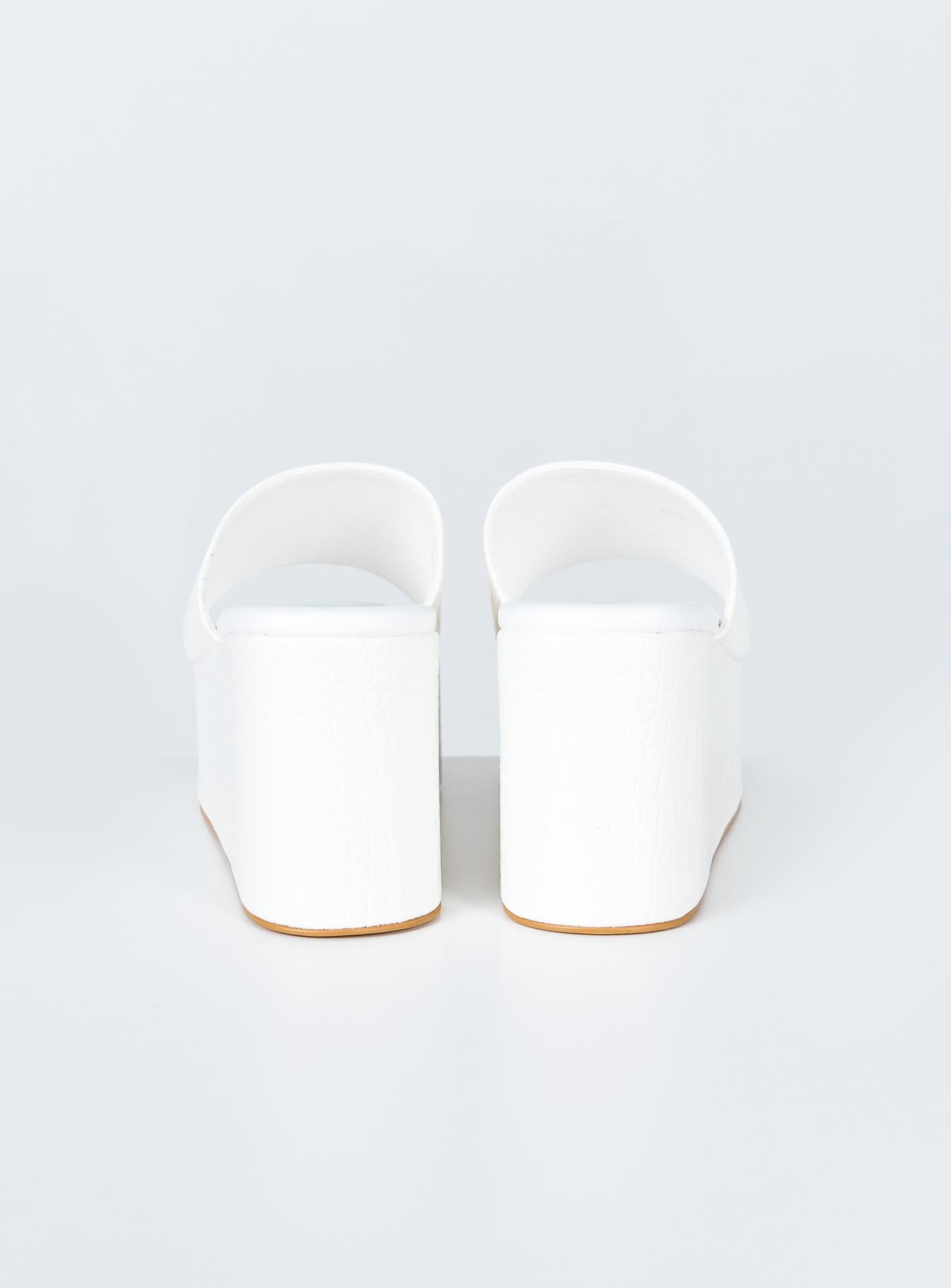 Heels Faux croc leather Single wide upper Rounded toe Padded footbed