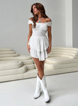 White romper Shirred waistband Ruffle detailing Elasticated neck and sleeves Can be worn on or off shoulder Layered ruffle hem Fully lined