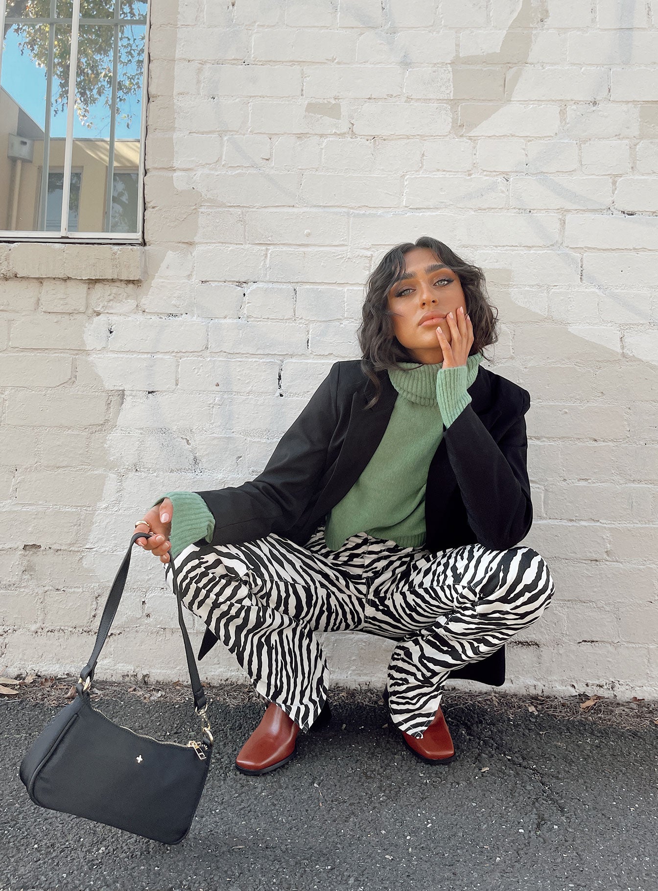 front view of model wearing Princess Polly Alabama Jeans Zebra Mid Rise 