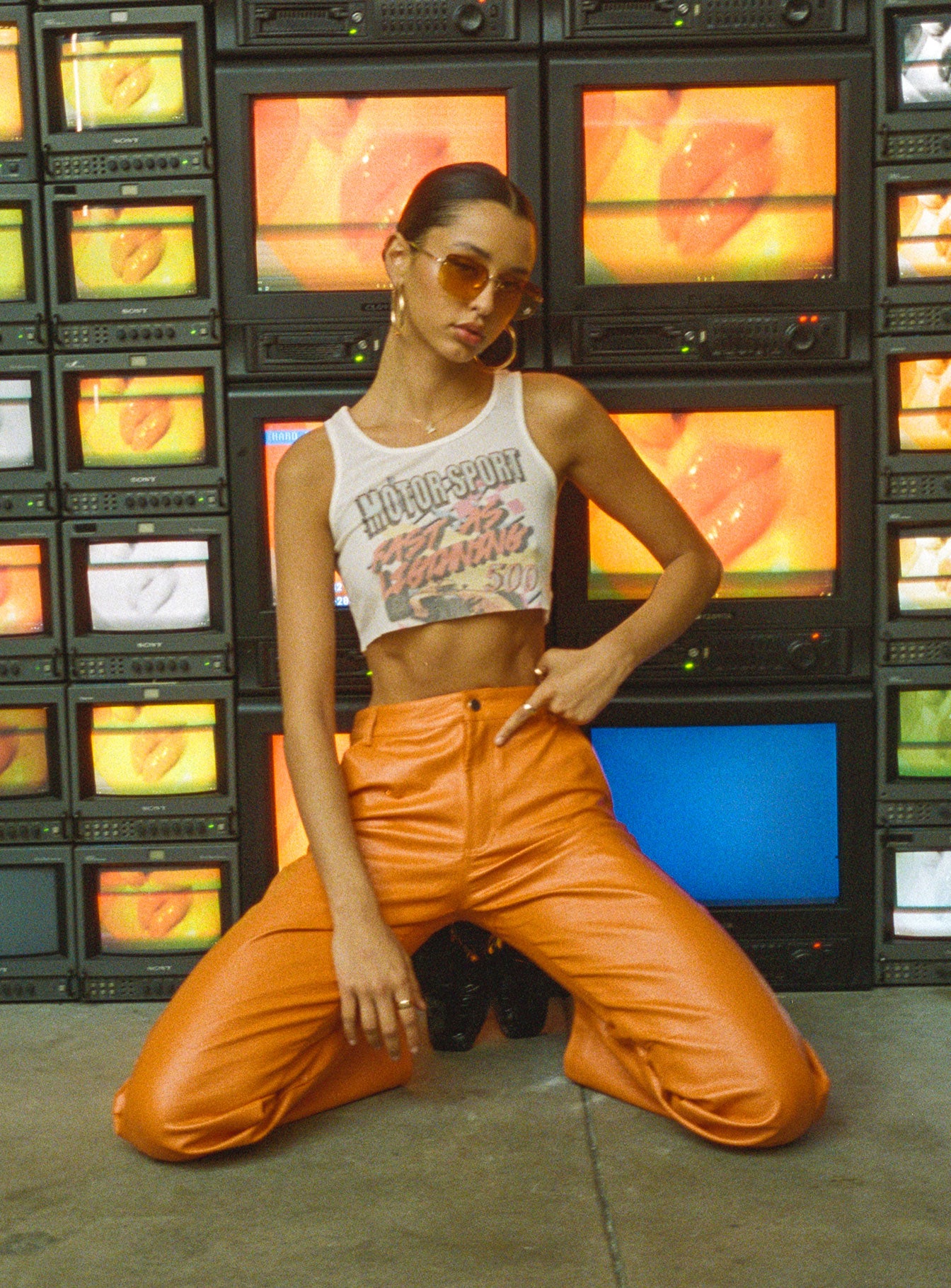 front view of model wearing Princess Polly Ashlea PU Pants Orange 