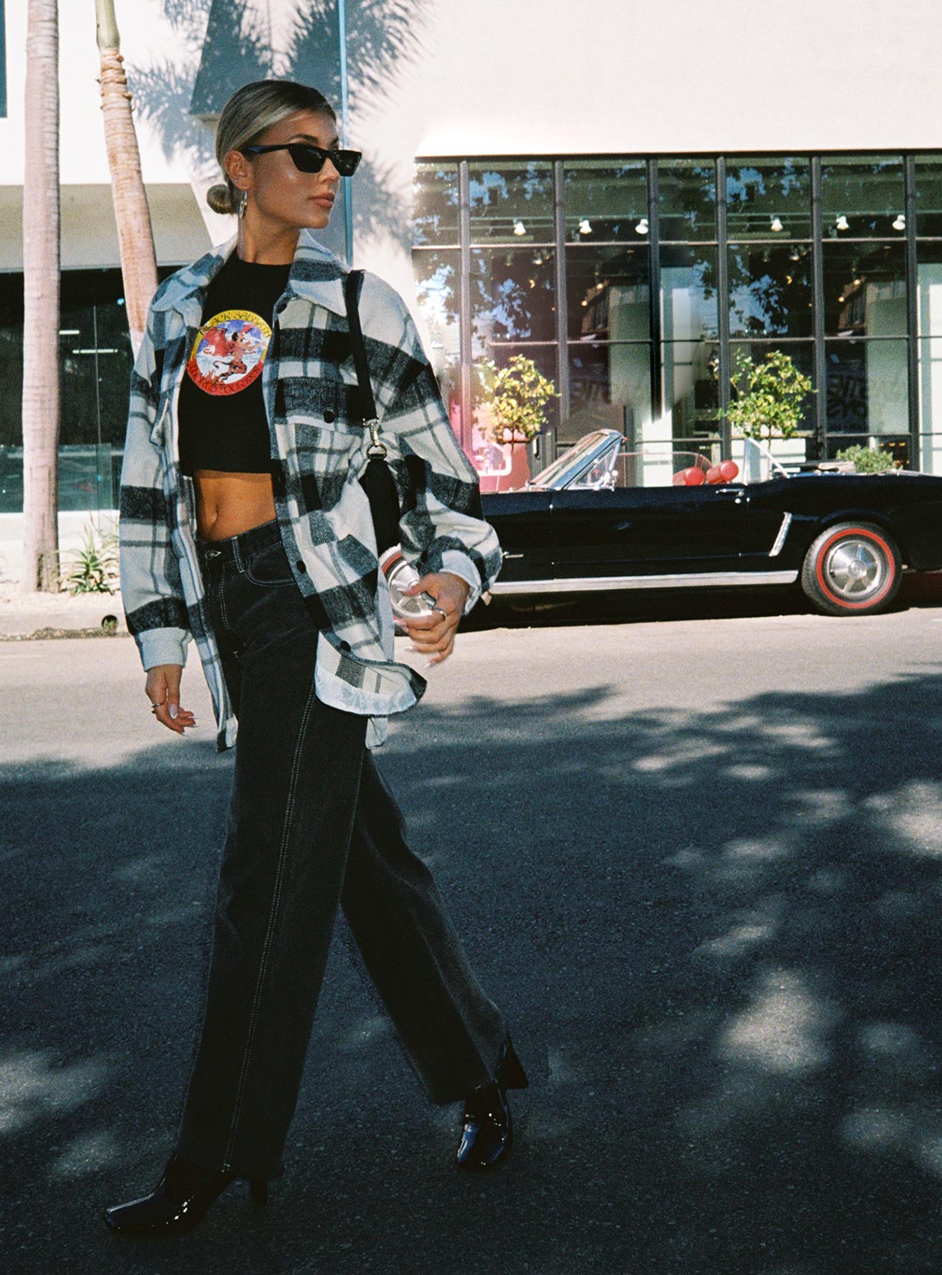 side view of model wearing Princess Polly Boundless Denim Jeans Black High Waisted 