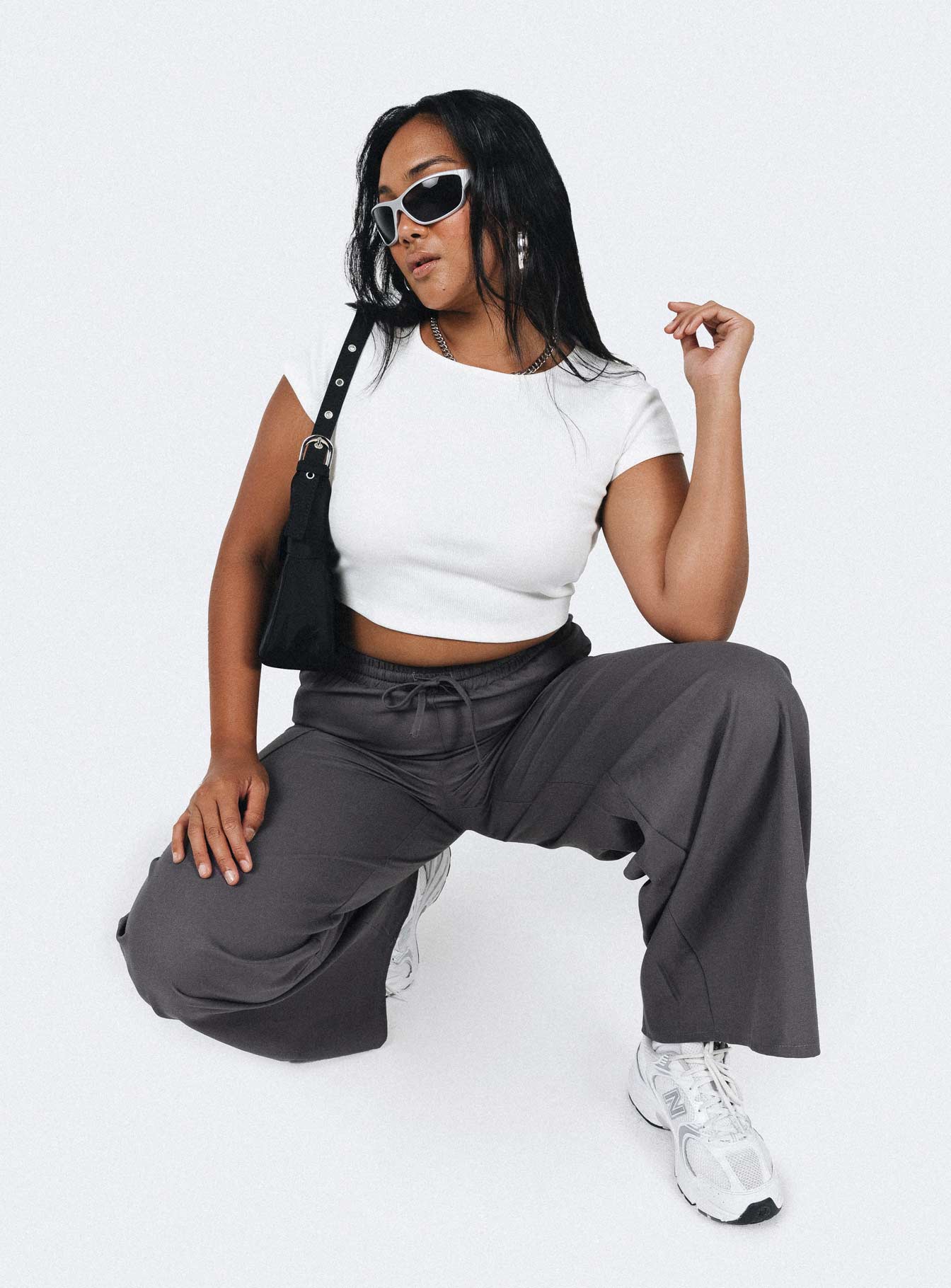 Front view of model wearing  front Princess Polly High Waisted Pants  Brunie Pants Slate