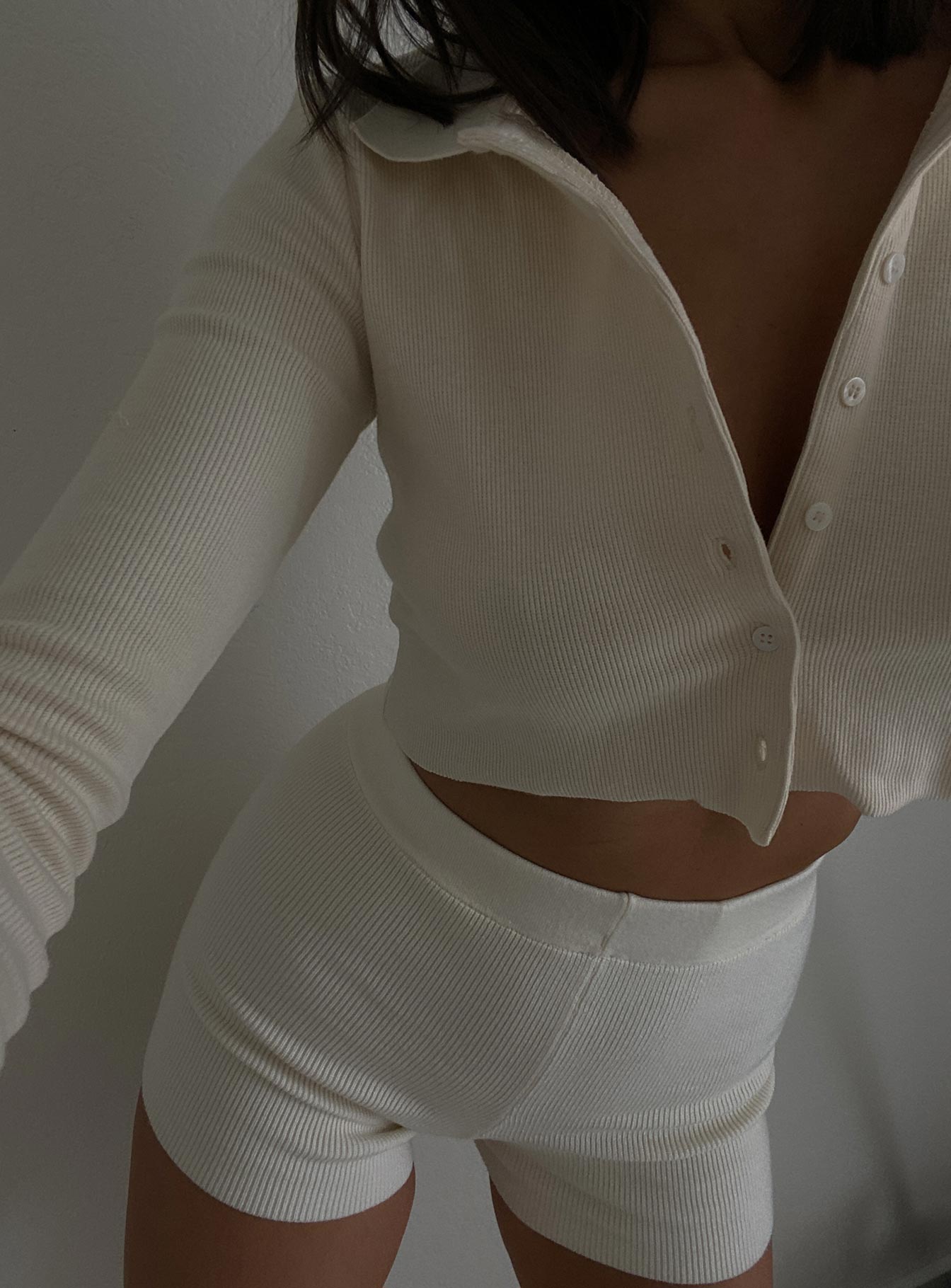 back view of model wearing Princess Polly Downtown Top Three Fourth Sleeves V-Neck 