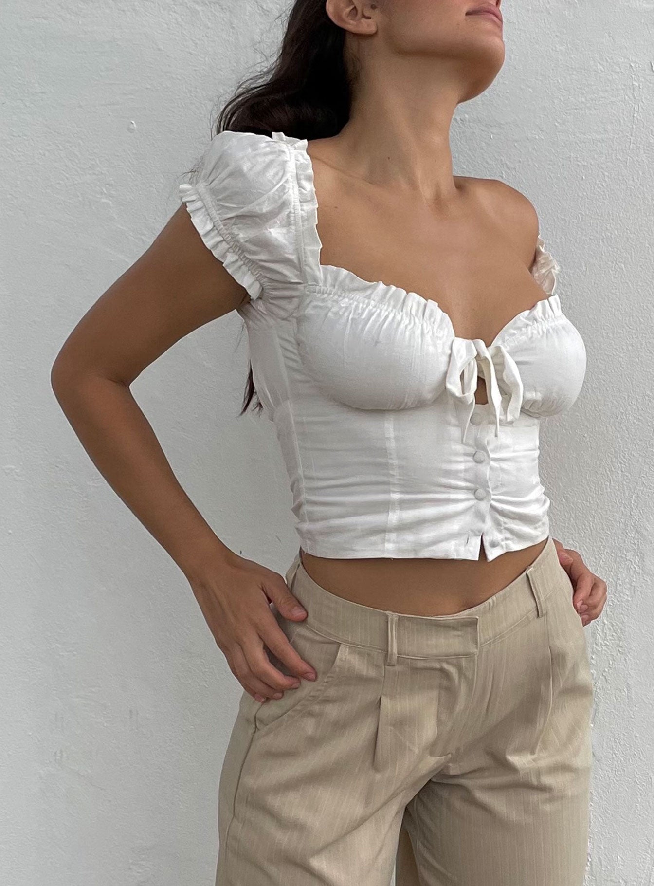 side view of model wearing Princess Polly Elouise Crop Top White 