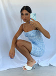 side view of model wearing Princess Polly Penney Mini Dress Blue Floral 