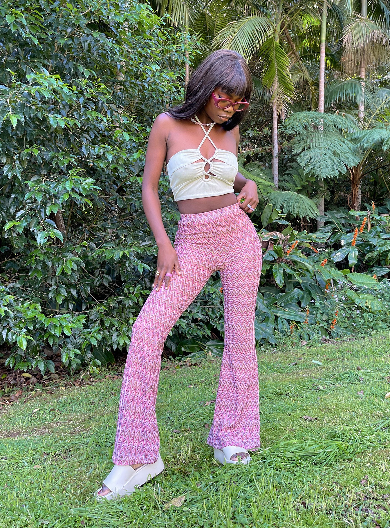 front view of model wearing Princess Polly Karmen Chevron Knit Flare Pants Pink 