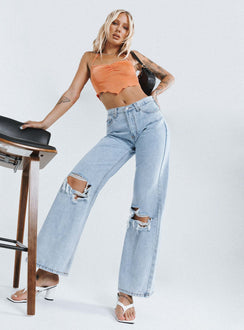 front view of model wearing Princess Polly Maple Flare Jeans Knee Rips Light Wash Denim Mid Rise 