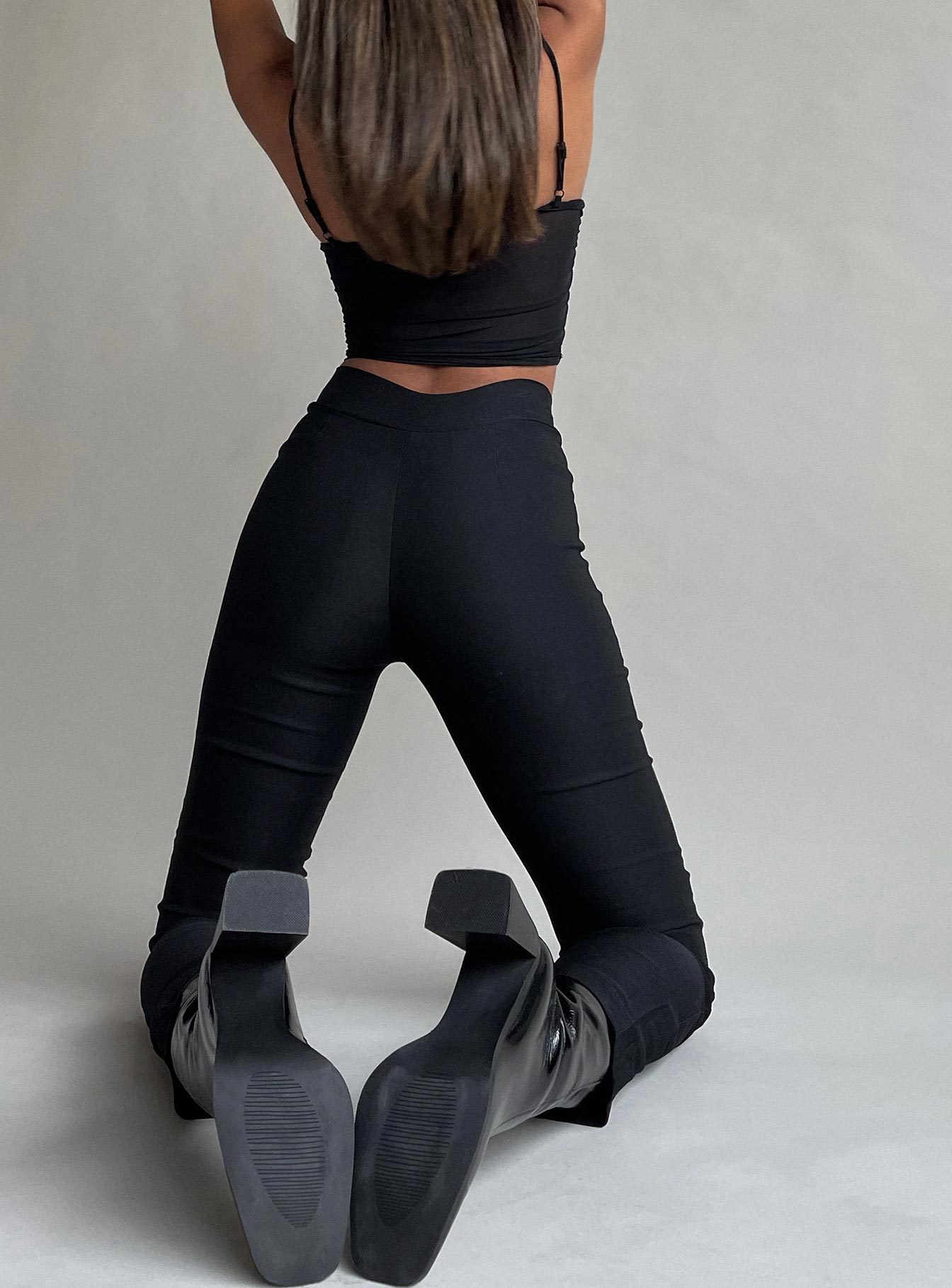 back view of model wearing Princess Polly Mikaela Pants Black 