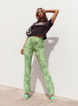 front view of model wearing Princess Polly Motel Heny Trouser Blurred Floral Green 