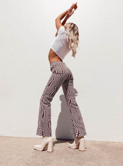 side view of model wearing Princess Polly Motel Jopan Trouser Optic Polka 