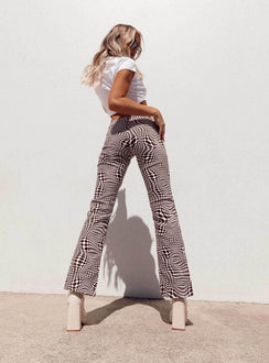 back view of model wearing Princess Polly Motel Jopan Trouser Optic Polka 