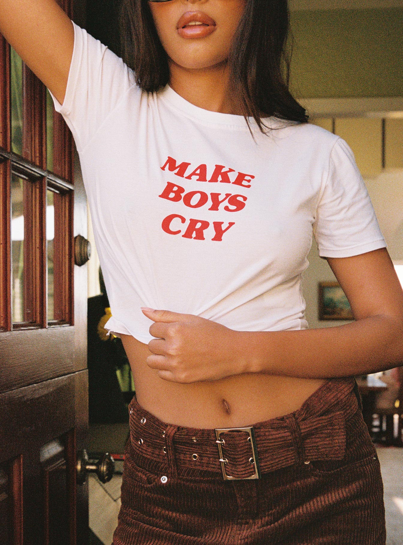 front view of model wearing Princess Polly Motel Shrunk Tee White Make Boys Cry 